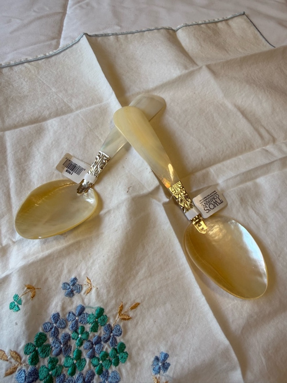 Two's Company mother of Pearl Serving Spoon with shell handle Silver Accent. 6”